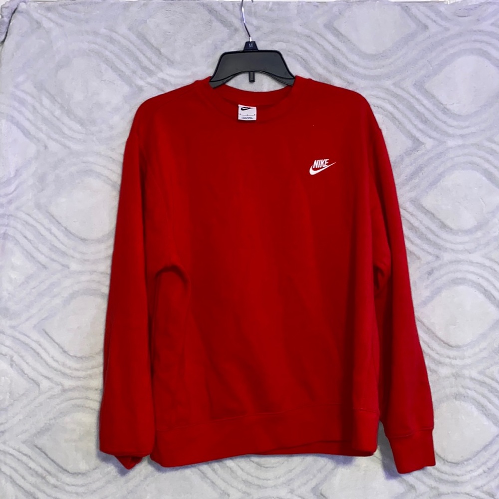 Red Nike crew neck.